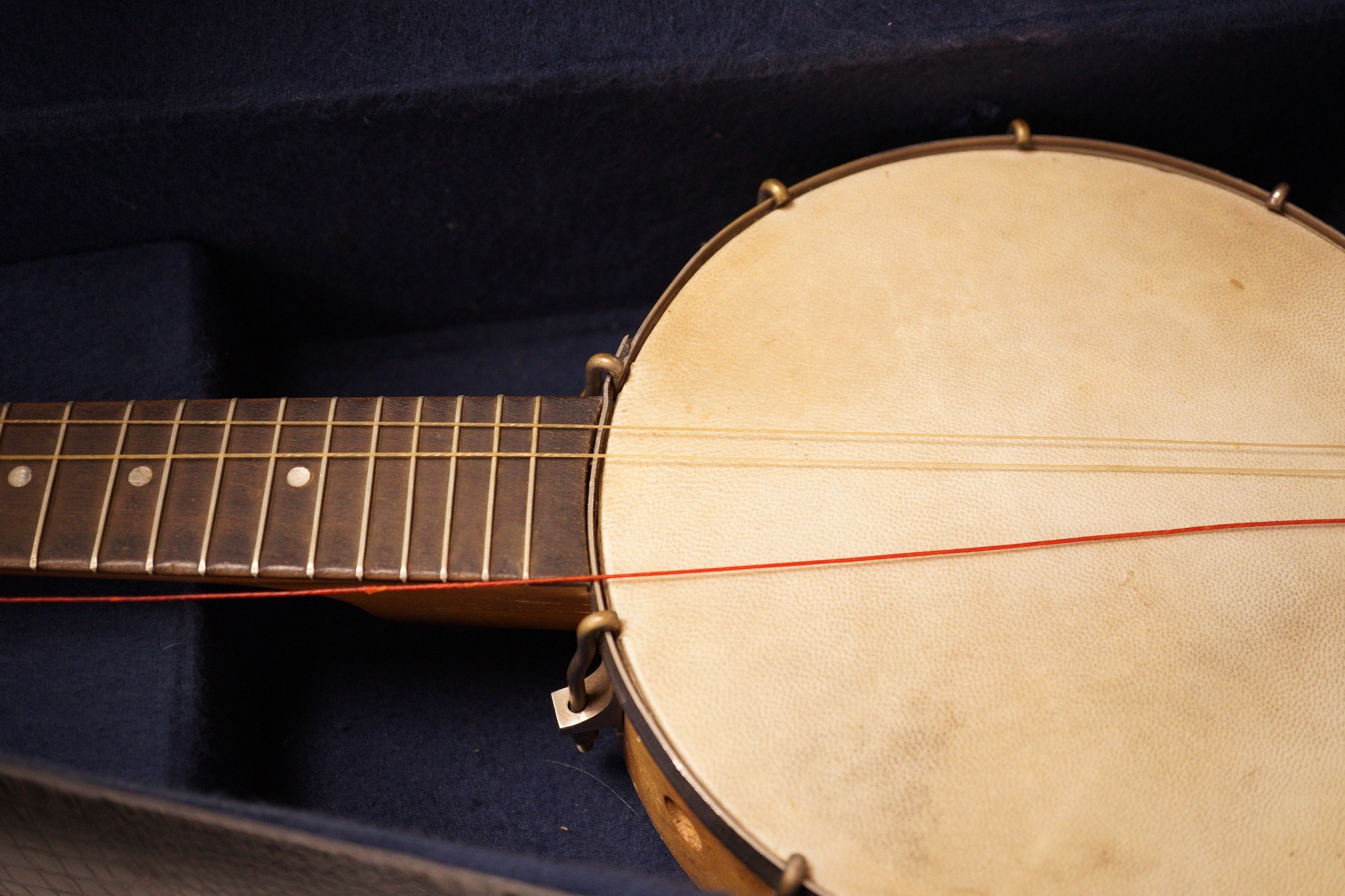 A ukelele banjo in case